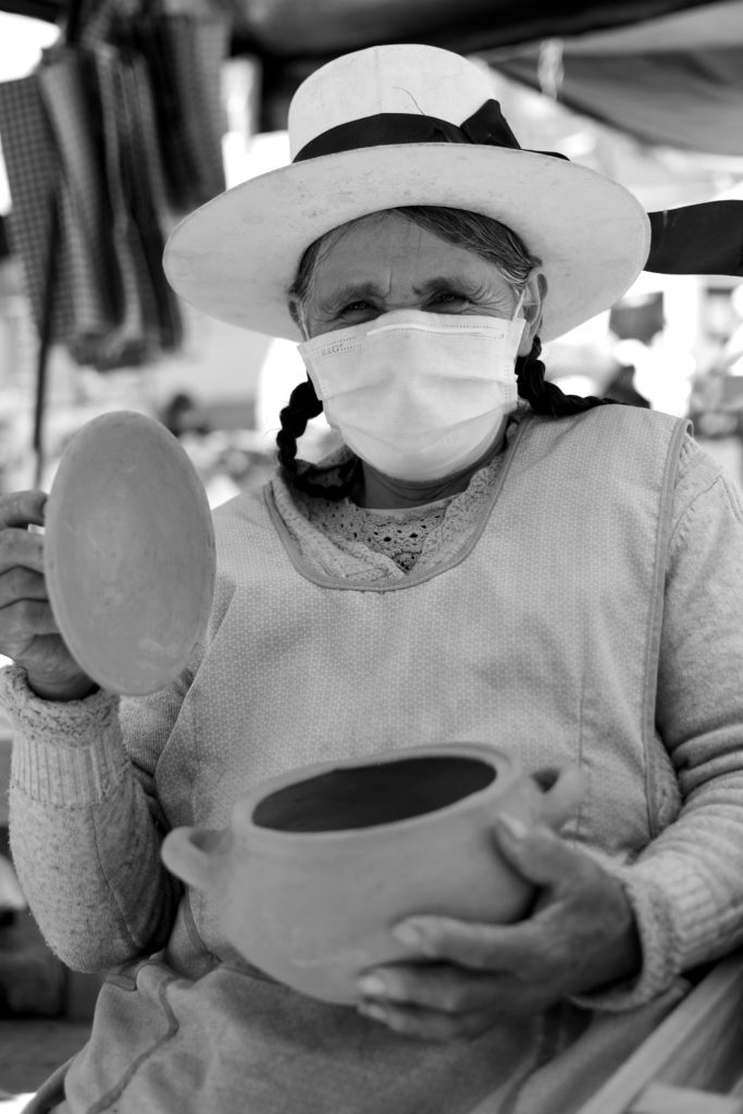 Market-woman with mask in Abancay