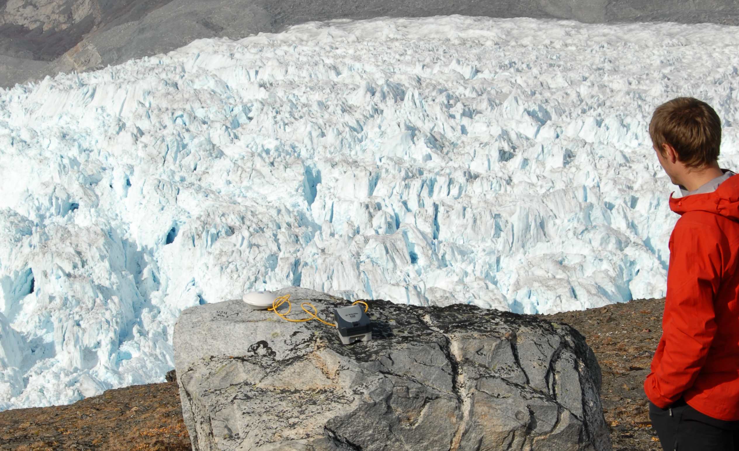 Ground control point measurement above Eqip Sermia Glacier, Greenland (R. Mercenier)
