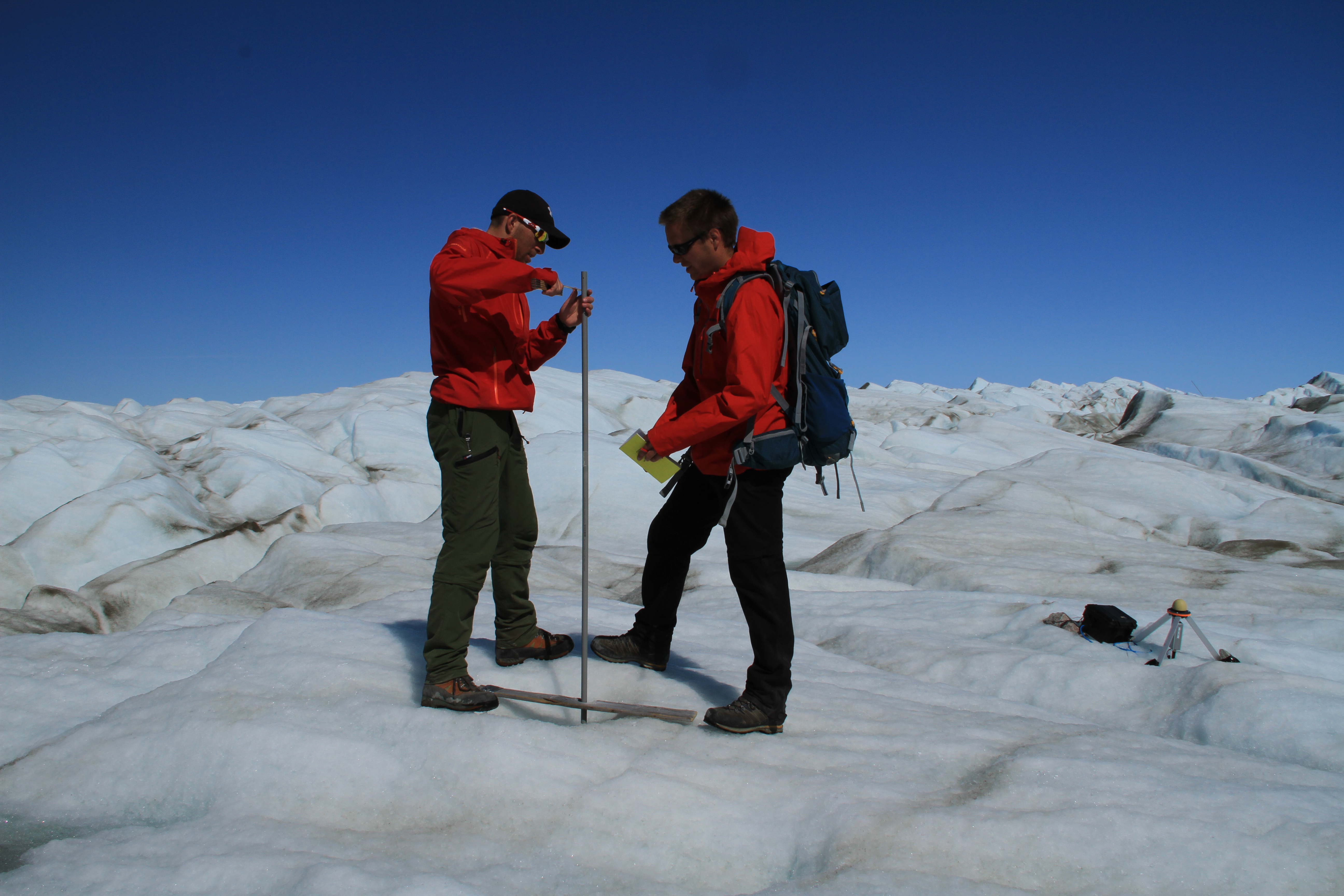 Ablation stake measurement on Eqip Sermia Glacier, Greenland (M. Lüthi)