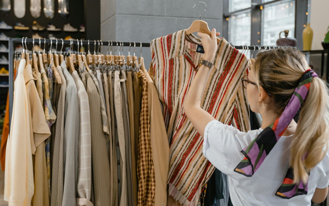 Woman working in a clothing shop